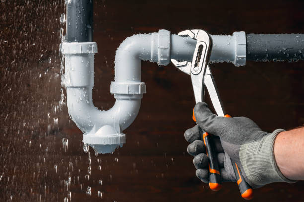 Professional Drain Cleaning technician working in Henryville, IN